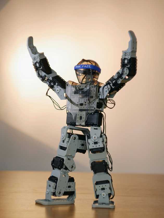 Grey robot raise hands